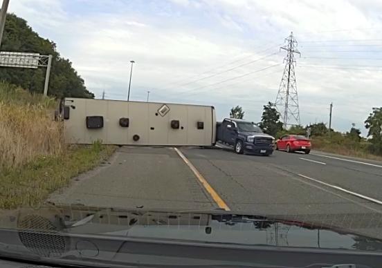 Ontario, Niagara-On-The-Lake, police, travel trailer, crash, flipped over, QEW, Glendale Avenue