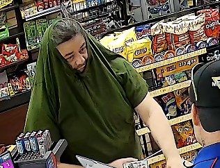 Man who pulled shirt over head robber wanted in Niagara-area